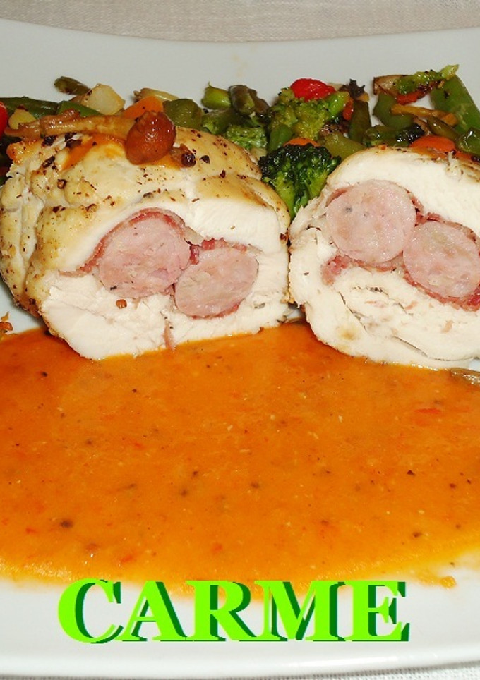 Una foto de Rollitos de pollo rellenos de jamón y salchichas