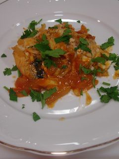 Una foto de Merluza en salsa roja fuerte