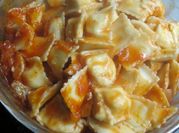 Una foto de raviolis espinaca