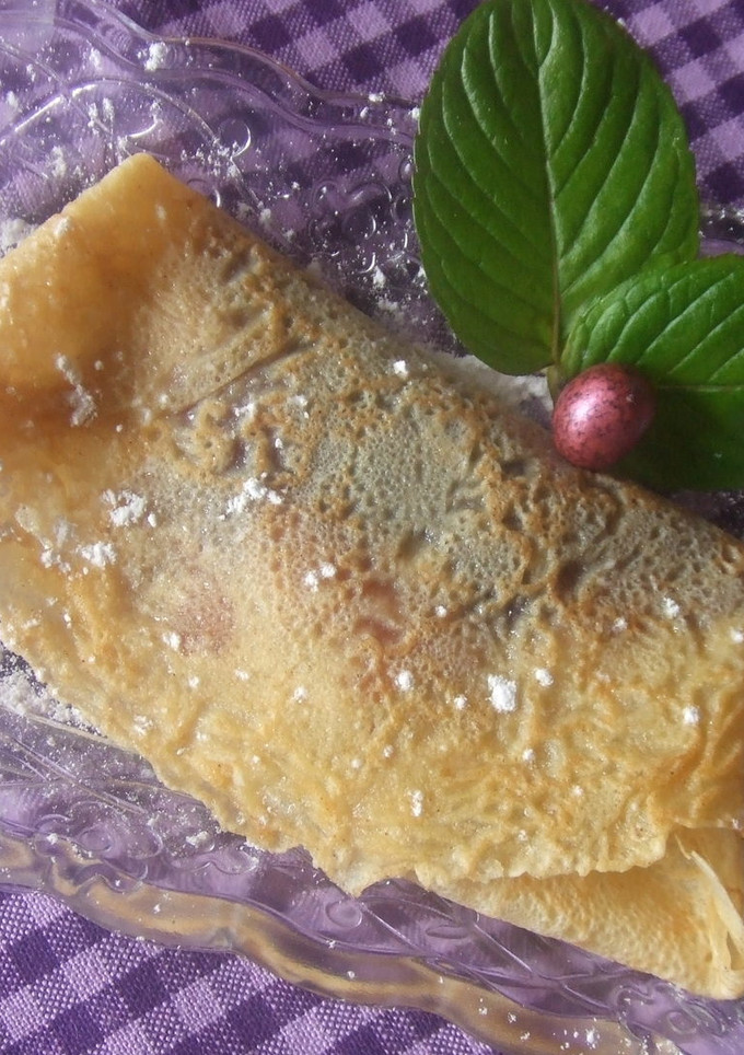 Una foto de Crêpes rellenas de mermelada casera de fresones