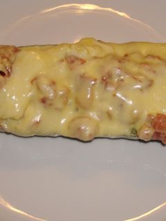 Una foto de Calabacines rellenos de carne y bacon