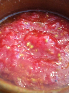 Una foto de Tomate rallado