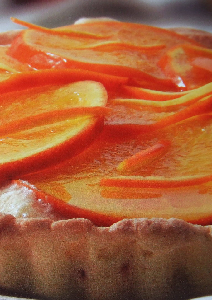 Una foto de Tarta de naranjas y crema al Cointreau