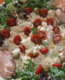 Ensalada alemana de patatas con rúcula y salsa de pepinillos