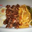 Plato combinado de conejo a las hierbas, pimiento, patata, y huevos