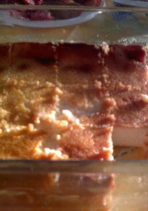 Una foto de Bizcocho de leche de coco y coco rallado