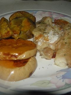 Una foto de Pescado con batata y calabaza al horno bajo colesterol