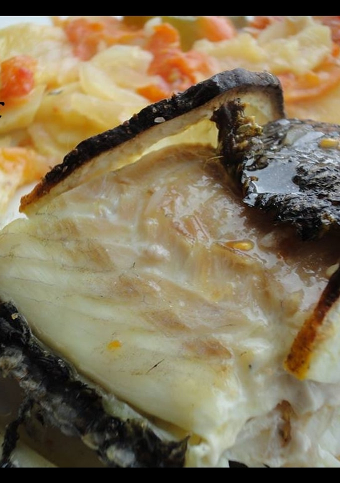 Una foto de Jargo a la plancha con calabacín