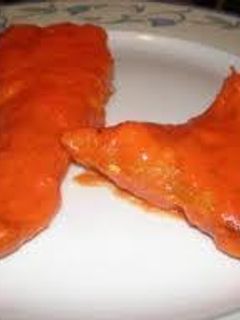 Una foto de Merluza en crema de pimientos