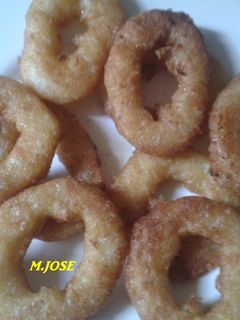Una foto de Calamares a la romana con cerveza
