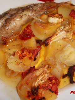 Una foto de Colas de rape con verduras al horno
