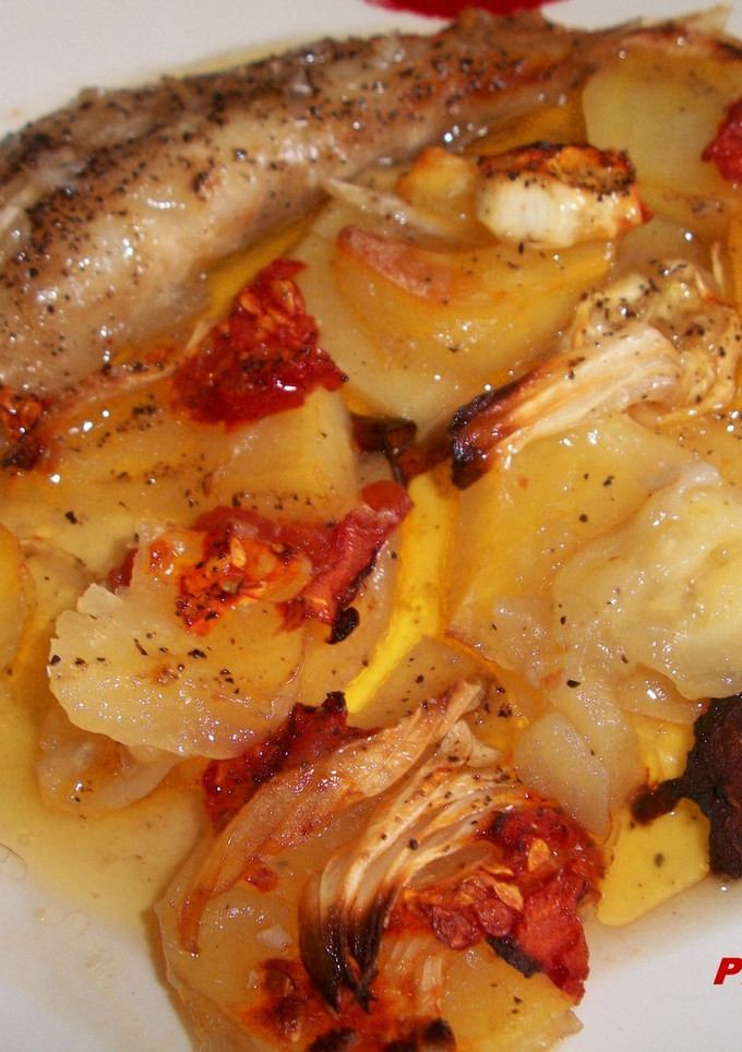 Una foto de Colas de rape con verduras al horno