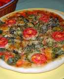 Pizza con canónigos