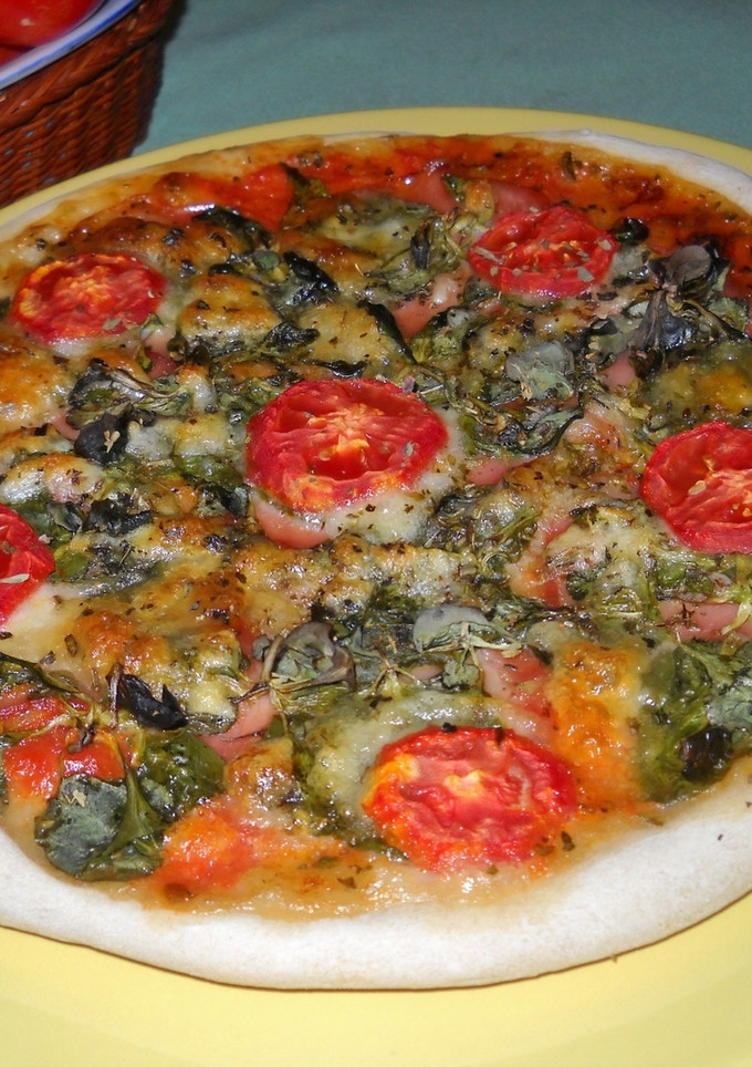 Una foto de Pizza con canónigos