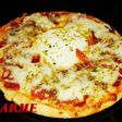 Pizzeta de quesos y jamón ibérico