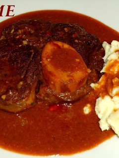 Una foto de Ossobuco de ternera al vino tinto