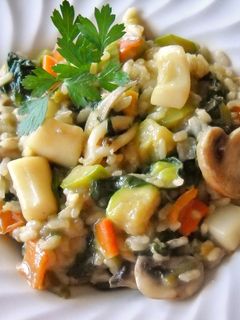 Una foto de Risotto de sepia y champiñones