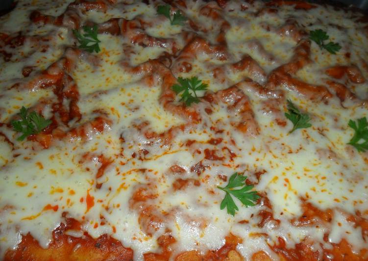 Pizza Casera Con Tomate Y Queso Receta De Gabriela Diez Cookpad
