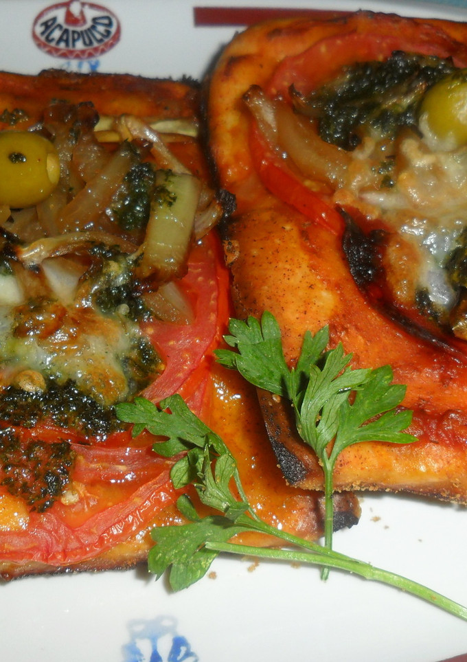 Una foto de Pizzetas mediterráneas