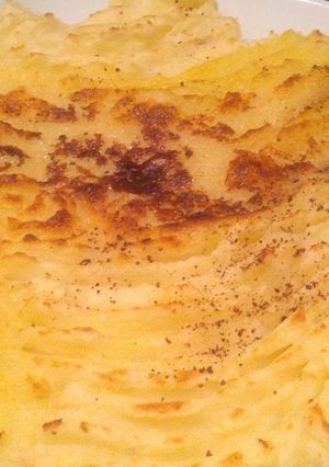 Una foto de Puré de patatas navideño con ajo y nuez moscada