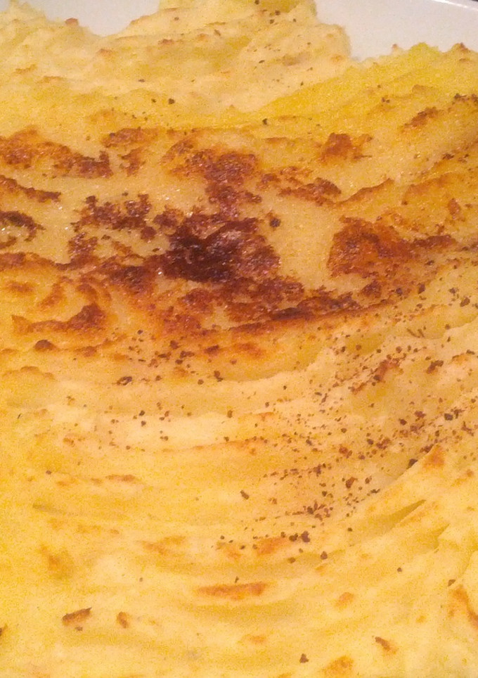 Una foto de Puré de patatas navideño con ajo y nuez moscada