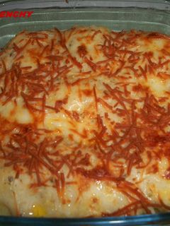 Una foto de Bolitas de puré de patatas rellenas de atún y gratinadas