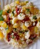 Risotto de calabaza amarilla, tomates secos y gambas