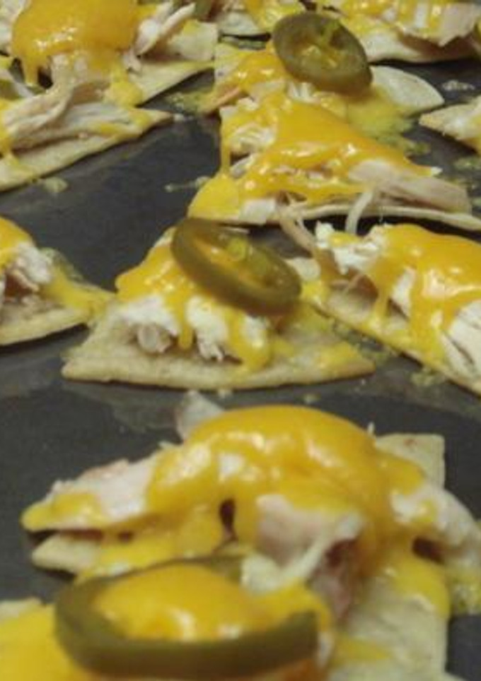 Una foto de Nachos de pollo