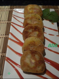 Una foto de Bocaditos de patatas con jamón ibérico