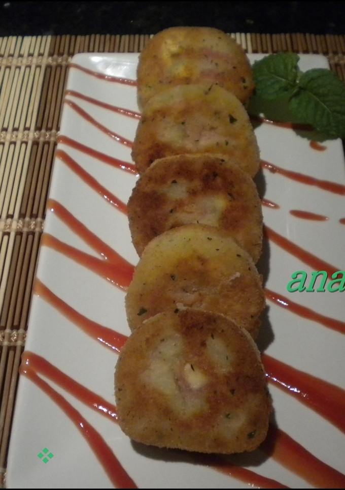 Una foto de Bocaditos de patatas con jamón ibérico