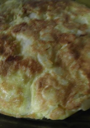 Una foto de Tortilla de papas y langostinos