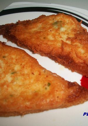 Una foto de Tostas crujientes de puré de patata y surimi