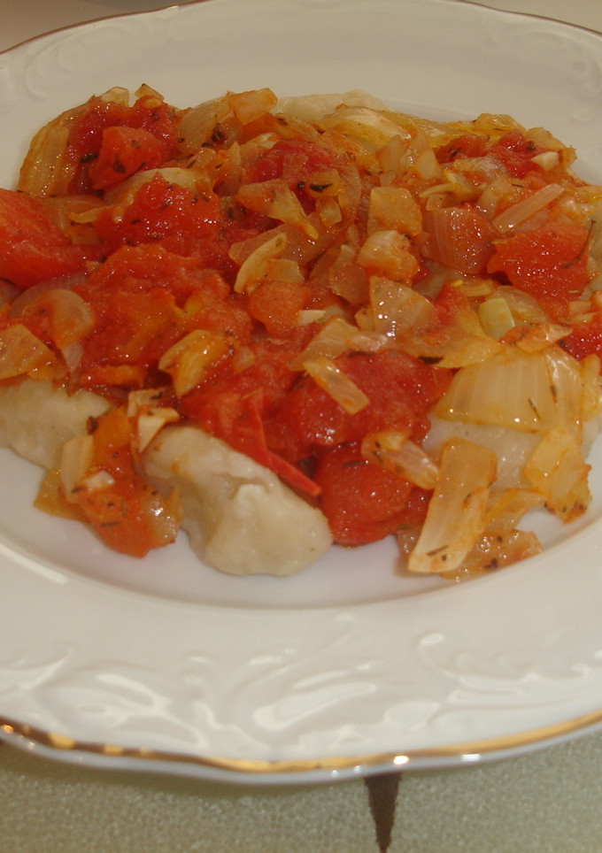 Una foto de Gnocchis con salsa de tomate condimentada