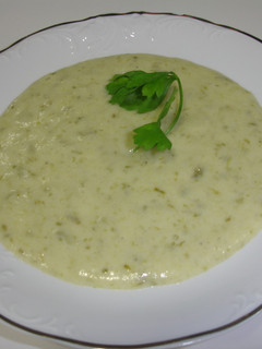 Una foto de Puré de patatas con pimientos verdes y bacalao