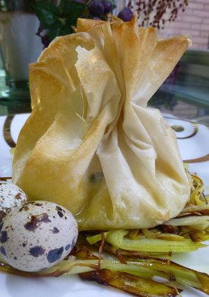 Una foto de Saquitos brick de puré de patata con huevos de perdiz y trufa natural