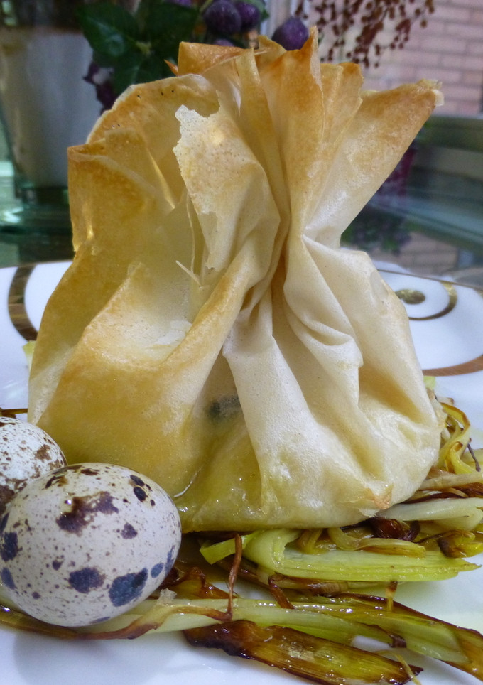 Una foto de Saquitos brick de puré de patata con huevos de perdiz y trufa natural
