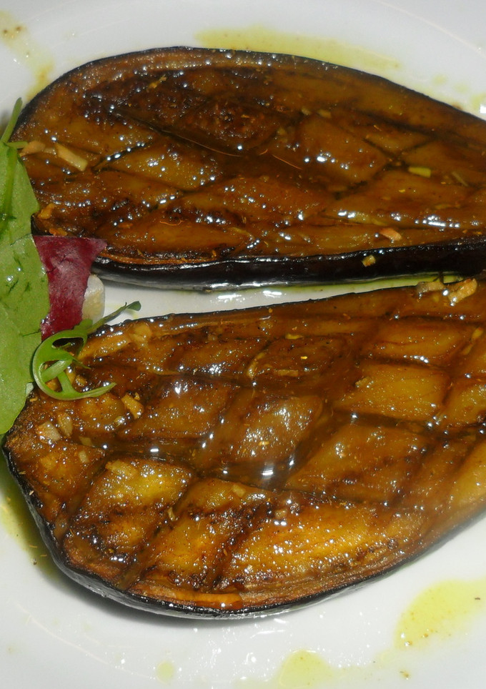 Una foto de Berenjenas asadas con curry y miel