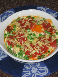 Una foto de Huevos al plato con queso