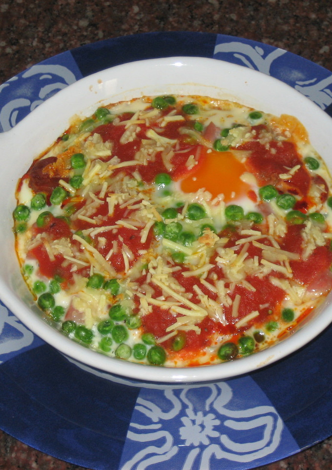 Una foto de Huevos al plato con queso