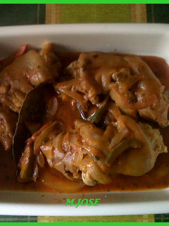 Una foto de Manos de cerdo con tomate