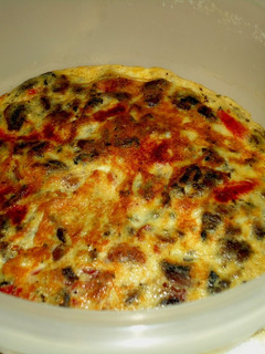 Una foto de Tortilla de champiñones con lomo
