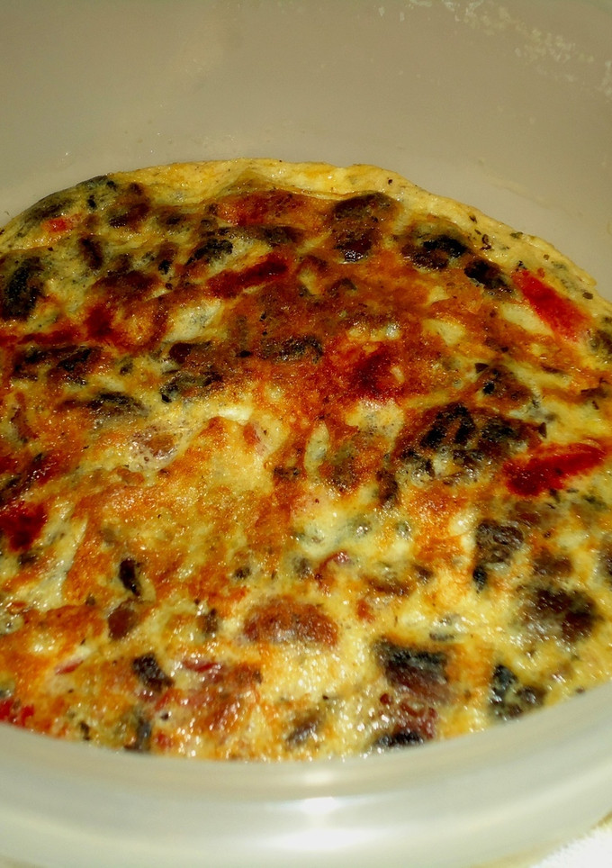 Una foto de Tortilla de champiñones con lomo
