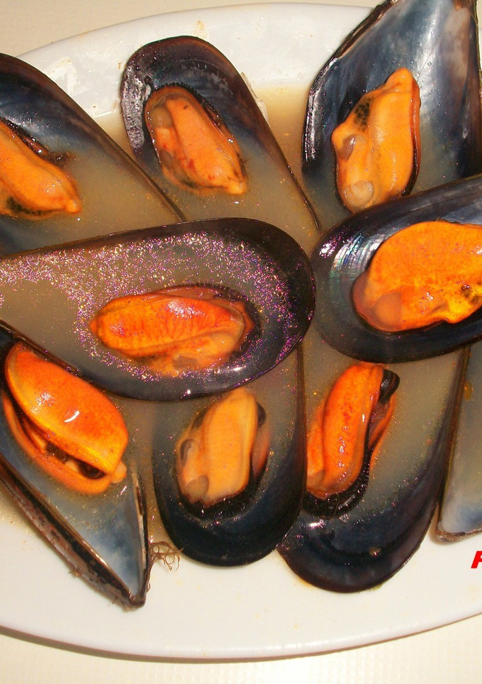 Una foto de Mejillones superpicantes al vapor