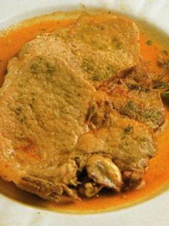 Una foto de Chuletas de cerdo a la jardinera