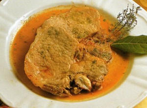 Una foto de Chuletas de cerdo a la jardinera