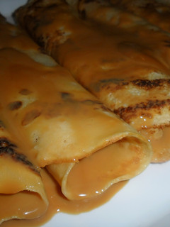 Una foto de Panqueques rellenos de dulce de leche