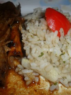 Una foto de Vacío al vino con arroz salteado