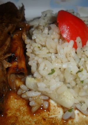 Una foto de Vacío al vino con arroz salteado