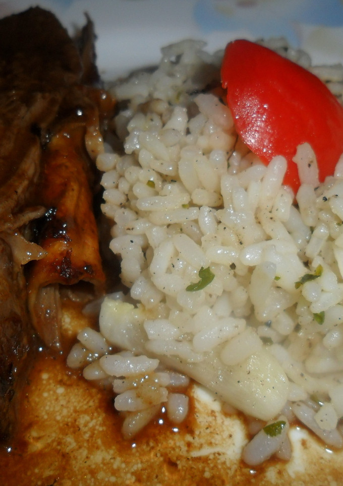 Una foto de Vacío al vino con arroz salteado