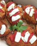 Milanesas de pollo rellenas con pimientos y quesos variados